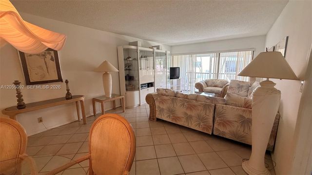 303 Racquet Club Road 206, Weston, FL 33326