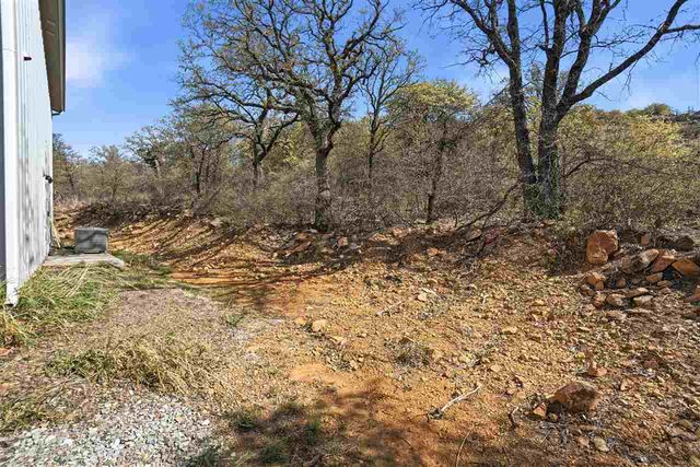 221 Merry Circle Dr, Medicine Park, OK 73557