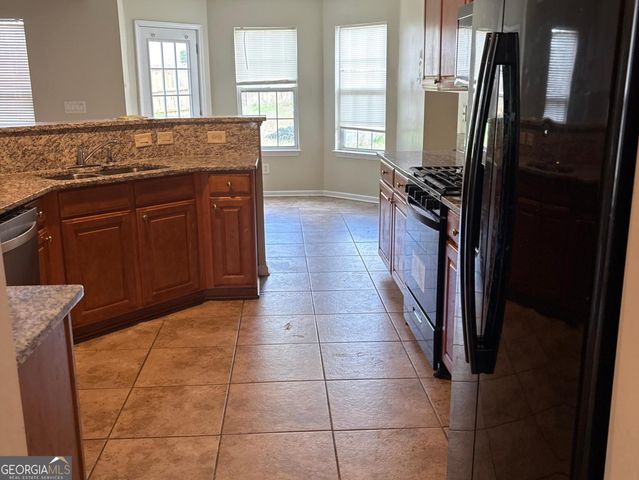 4208 Medlock Woods Drive, Snellville, GA 30039