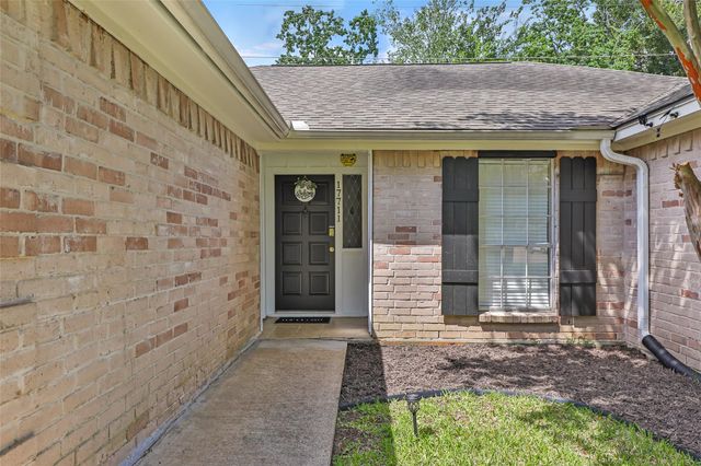 17711 Smooth Rock Falls Drive, Spring, TX 77379