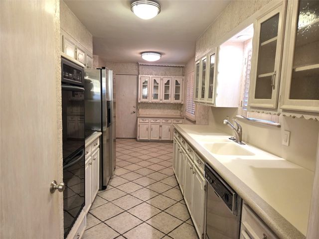 9334 Hunters Creek Drive, Dallas, TX 75243