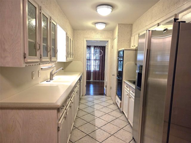 9334 Hunters Creek Drive, Dallas, TX 75243