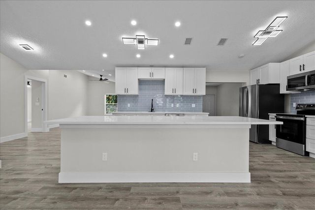 14618 63rd Court N, The Acreage, FL 33470