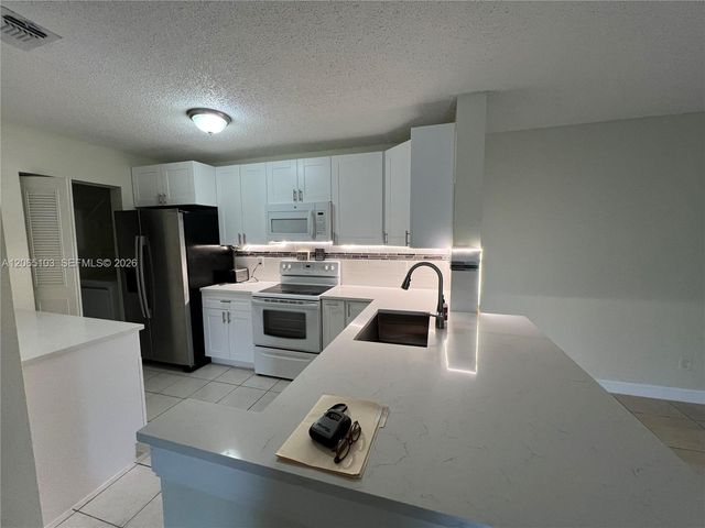 11277 W Atlantic Boulevard 304, Coral Springs, FL 33071