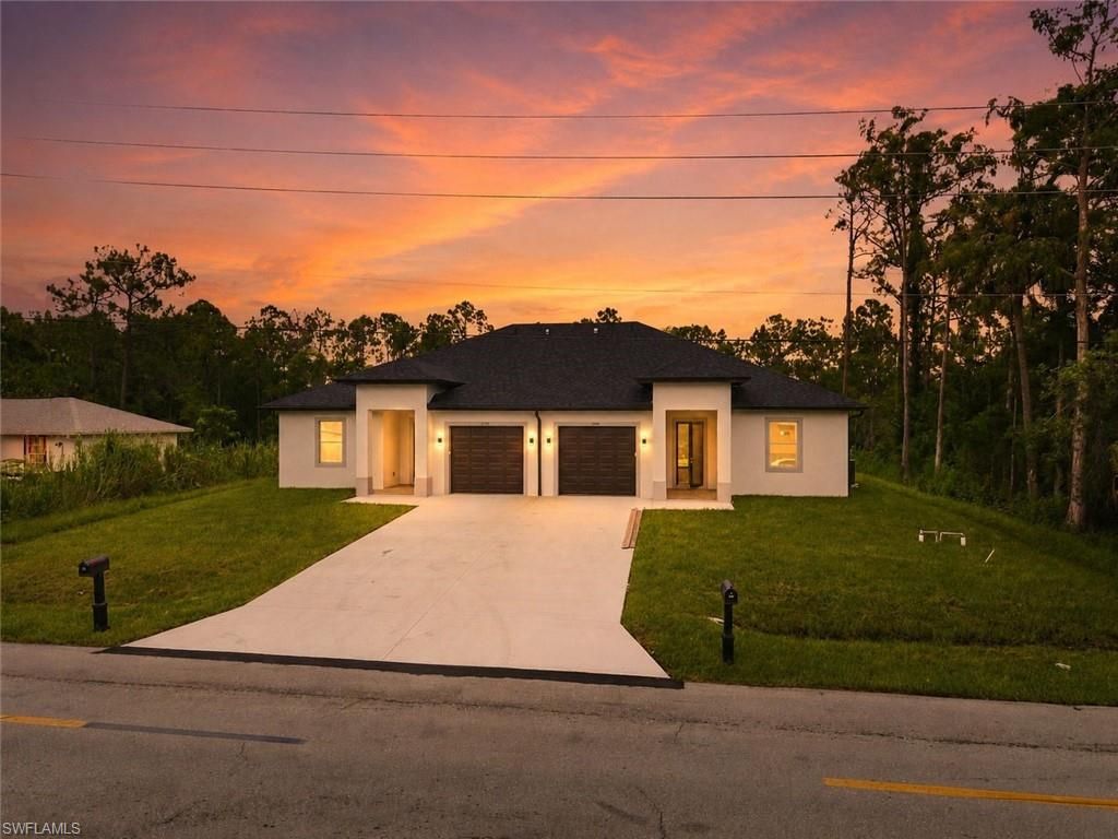 2909/2911 Owen AVE S, LEHIGH ACRES, FL 33973 — exterior
