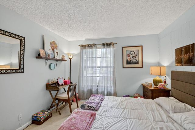 9810 Pineapple Tree Drive 103, Boynton Beach, FL 33436