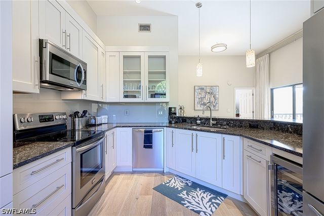 589 Beachwalk CIR P-203, Naples, FL 34108