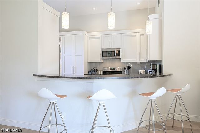 589 Beachwalk CIR P-203, Naples, FL 34108