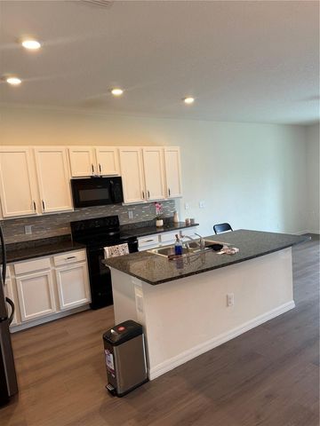 1833 HOVENWEEP ROAD, Wesley Chapel, FL 33543