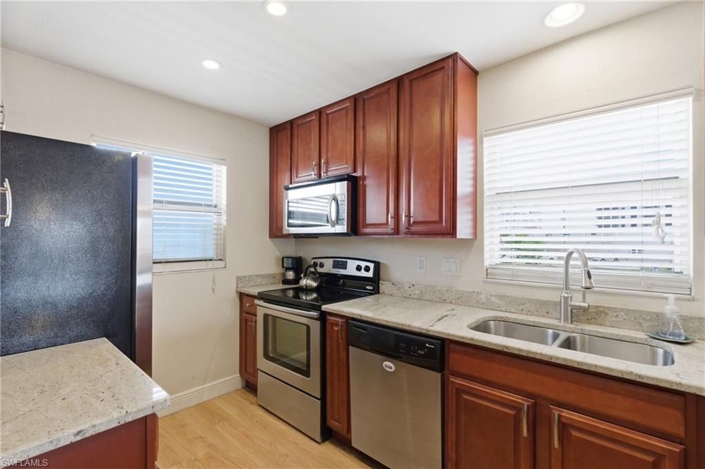 Image 6 of property listing at 4718 SE 5th AVE 9, Cape Coral, FL 33904