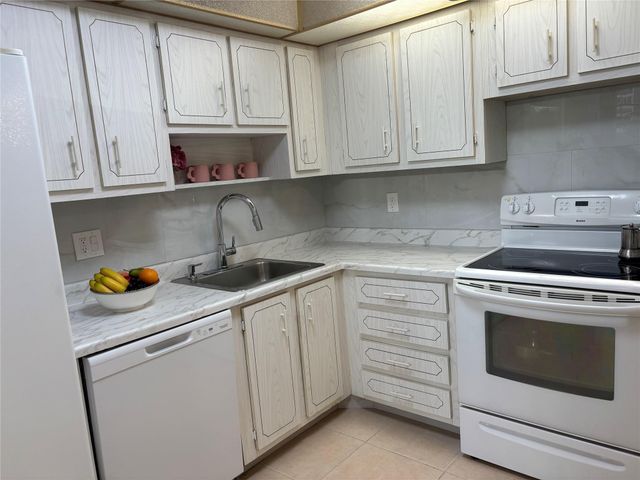 1100 SAINT CHARLES Place 313, Pembroke Pines, FL 33026