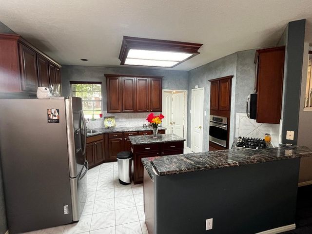 4508 Park Shadow Drive, Baytown, TX 77521