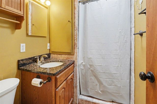 761 S Coolidge Drive, Six Lakes, MI 48886