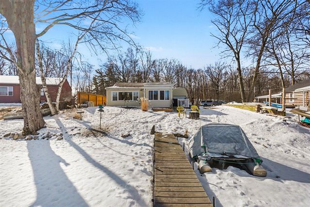 761 S Coolidge Drive, Six Lakes, MI 48886