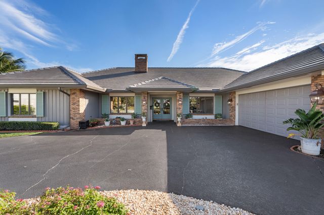 427 Glenbrook Drive, Atlantis, FL 33462