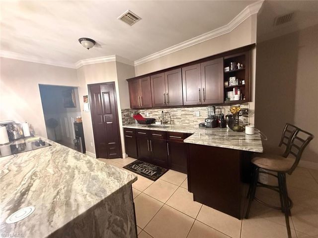 122 Grant BLVD, Lehigh Acres, FL 33974