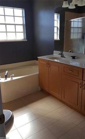 122 Grant BLVD, Lehigh Acres, FL 33974