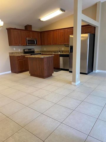 4302 Woodstock Drive B, West Palm Beach, FL 33409