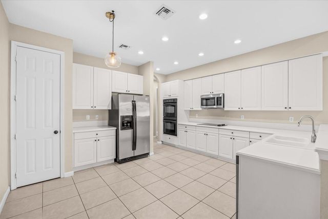 2166 SW NEWPORT ISLES Boulevard, Port St. Lucie, FL 34953