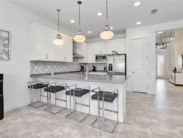 12779 Woodbury DR, Estero, FL 33928