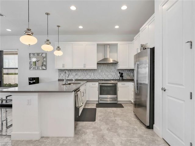 12779 Woodbury DR, Estero, FL 33928