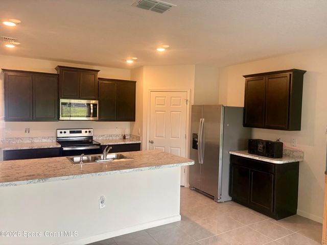 859 Serenade Street NW, Palm Bay, FL 32907