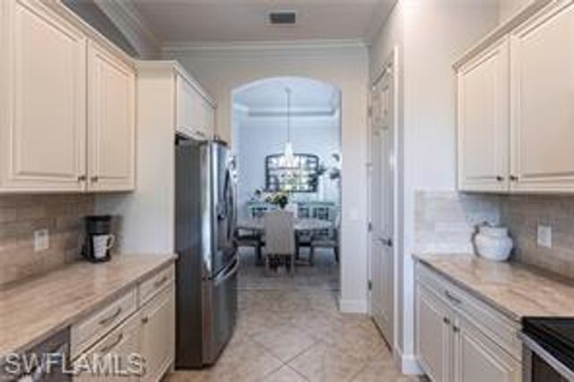 9550 Ironstone TER 201, Naples, FL 34120