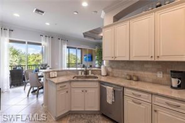 9550 Ironstone TER 201, Naples, FL 34120