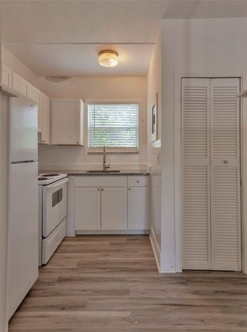 1102 SUNSET POINT ROAD, Clearwater, FL 33755