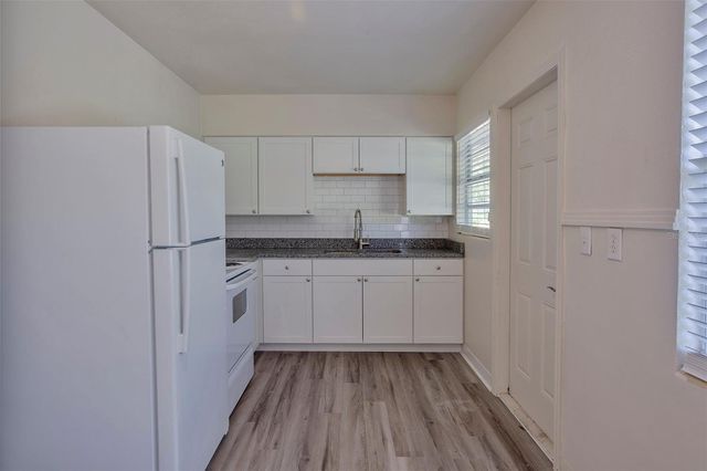 1102 SUNSET POINT ROAD, Clearwater, FL 33755