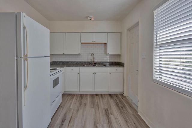 1102 SUNSET POINT ROAD, Clearwater, FL 33755