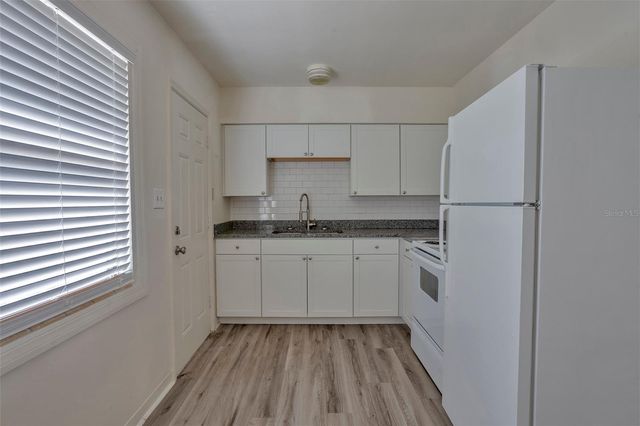 1102 SUNSET POINT ROAD, Clearwater, FL 33755