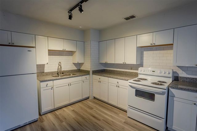1102 SUNSET POINT ROAD, Clearwater, FL 33755