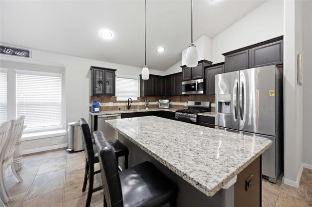 712 Rim Water Drive, Alvin, TX 77511
