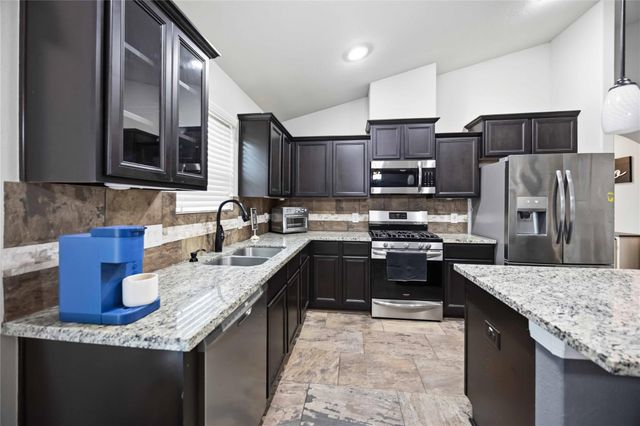 712 Rim Water Drive, Alvin, TX 77511