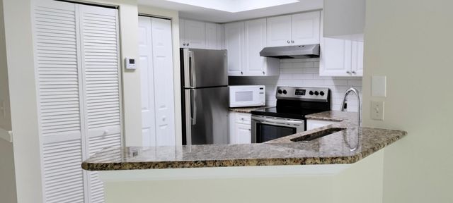 1000 Crestwood Court S 1008, Royal Palm Beach, FL 33411