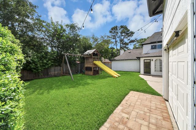 9114 Taidswood Drive, Spring, TX 77379