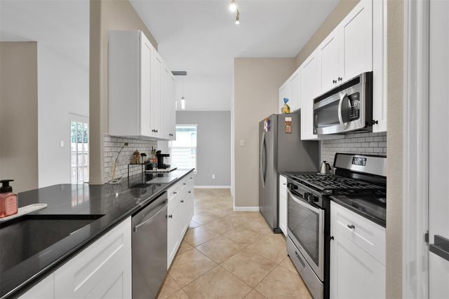 1002 Oak Glen Drive, Conroe, TX 77378