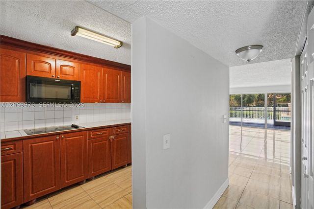 661 N University Dr 1-103, Pembroke Pines, FL 33024