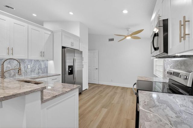 5891 Royal Isles Boulevard, Boynton Beach, FL 33437