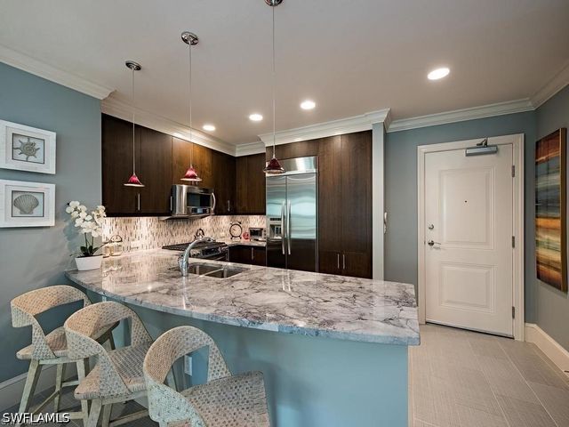 9123 Strada PL 7306, Naples, FL 34108