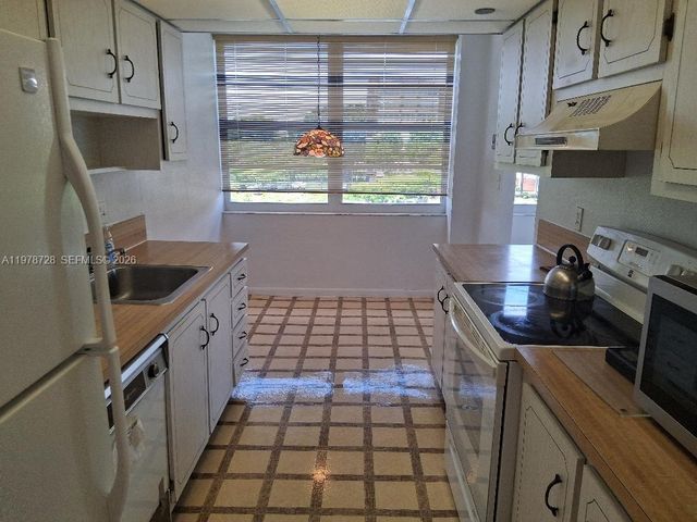 1300 St Charles Place 419, Pembroke Pines, FL 33026