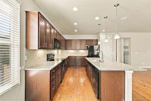 1653 Trefoil Circle, Brighton, CO 80601