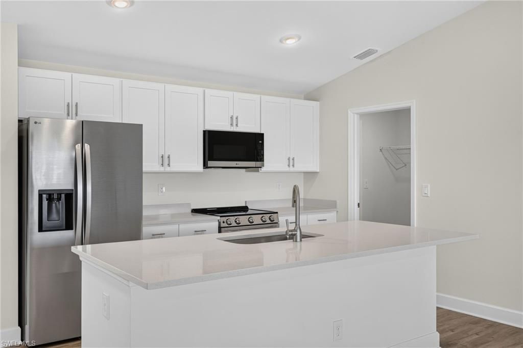 Image 12 of property listing at 424 NW 17th PL, Cape Coral, FL 33993
