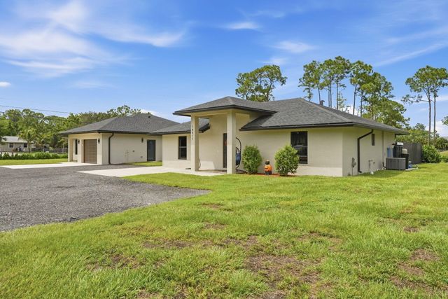 18477 Sycamore Drive W, The Acreage, FL 33470