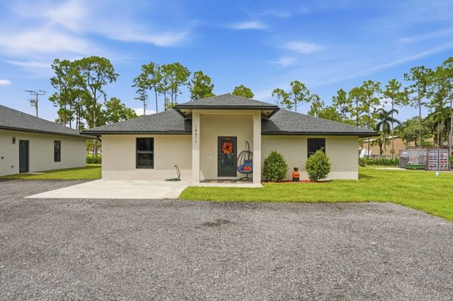 18477 Sycamore Drive W, The Acreage, FL 33470