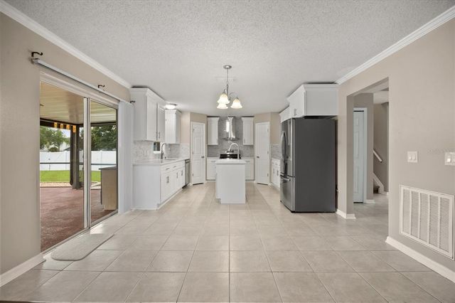2725 WHITE MAGNOLIA LOOP, Clermont, FL 34711