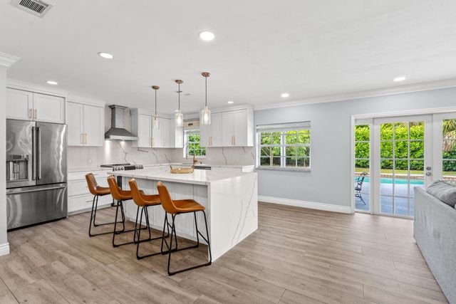 10098 Ramblewood Drive, Coral Springs, FL 33071