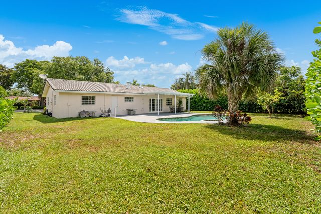 10098 Ramblewood Drive, Coral Springs, FL 33071