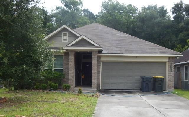 1139 Shadow Glenn Drive, Conroe, TX 77301